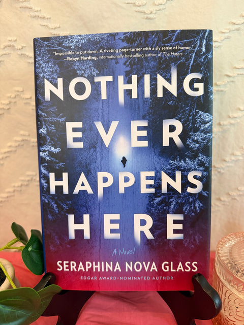 Nothing Ever Happens Here by Seraphina Nova Glass