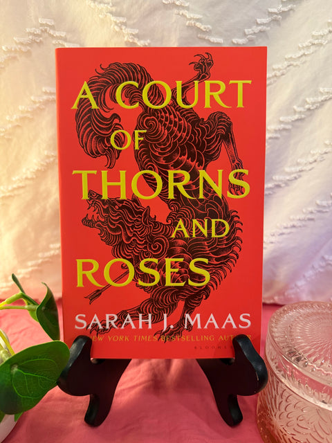 A Court of Thorns and Roses by Sarah J. Maas paperback book cover